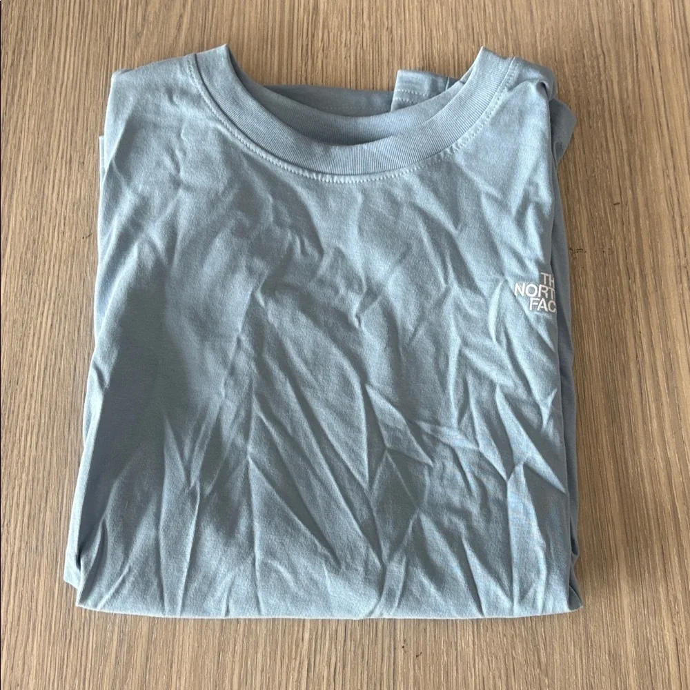 The North Face Men’s XL Short Sleeve Tee – Light Blue. New without tags!